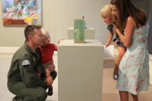 Military family visits art gallery