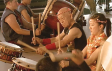 Taiko drummers performing on stage