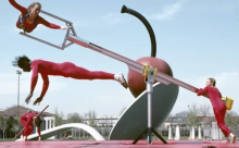 Rotator sculpture with gymnasts 