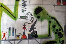 Mural of scientist at microscope 