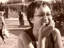 Woman with short hair laughing