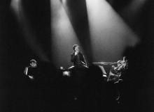 Ben Folds performing onstage with orchestra