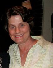 Head shot of woman with brown hair