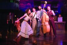 trio of musicians with female dancer/actor listening