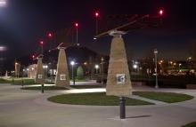 The Main Terrain is an urban park in Chattanooga, Tennessee that features several pieces of public art including a sculpture modeled from cast concrete pylons and steel trusses that can be turned using a wheel at the base.