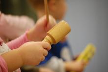 Children's hands playing instruments