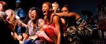 Group of actresses shouting at audience