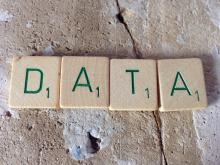 Scrabble tiles that spell out the word data