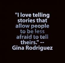 Quote on a black background I love telling stories that allow people to be less afraid to tell theirs.