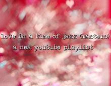 blurred red and white background of hearts with name of playlist written over it