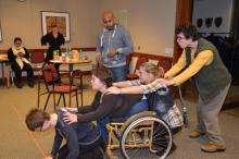 Group of disabled Croatian young adults practicing a play. 