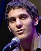 Photo of Kareem Sayegh reciting