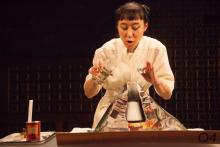 Woman preparing to conduct a volcano baking soda science experiment