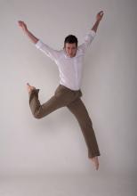 Dancer Sean Dorsey caught mid-leap.