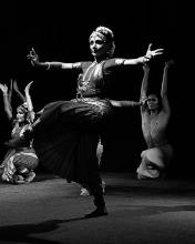 a woman performing Indian classical dance