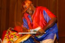 A man playing a large drum.