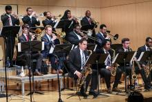 The Gathering Orchestra jamming on stage at the Detroit School of Arts, following a week-long residency. 