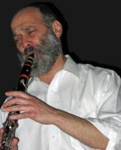 Man playing a clarinete.