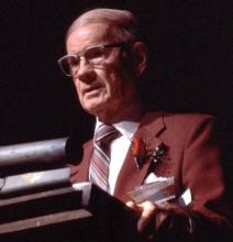 A man at a podium.