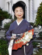 A woman in traditional Japanese dress.