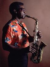 A man playing a saxophone.