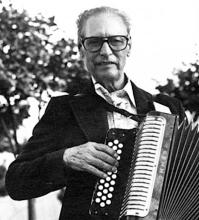 Man playing an accordion.
