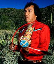 Man holding an instrument.