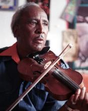 Man playing a violin.