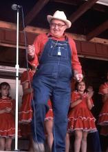 A man doncing on a stage.