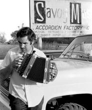 A man playing the accordion.