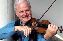A man playing a violin.