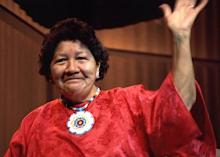 A woman waving her arm.