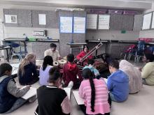 Devesh Chandra (left) and Veena Chandra (right) play North Indian classical music for children in a Schenectady School District classroom. Photo courtesy of New York Folklore Society 