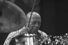 Man playing drums. 