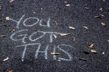 photo of chalk drawing on sidewalk that says You Got This