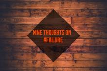 Text that reads "Nine Thoughts on Hashtag Failure" against a photo background that looks like wood planks