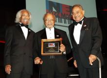 2009 NEA Jazz Master Eugene Edward “Snooky” Young is presented with his award by friends and fellow NEA Jazz Masters Gerald Wilson and Frank Wess. Photo by Tom Pich