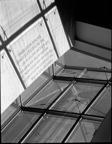 Photo of window with writing on it. 