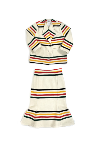 Outfit with black, red, and yellow stripes. 