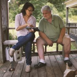 Filmmaker Jennifer Crandall on a porch with two older white people