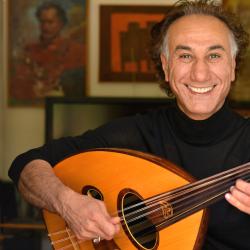 Rahim AlHaj playing the oud.