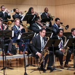 The Gathering Orchestra jamming on stage at the Detroit School of Arts, following a week-long residency. 
