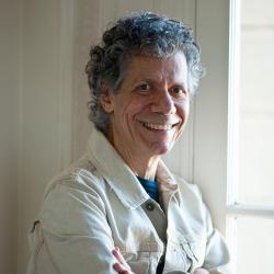 Portrait of man with arms folded
