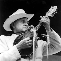 AS man playing a mandolin.