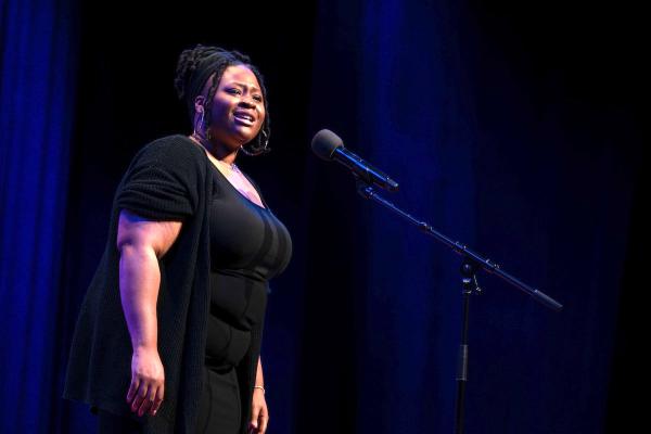 2024 Poetry Out Loud National Champion Niveah Glover reciting onstage