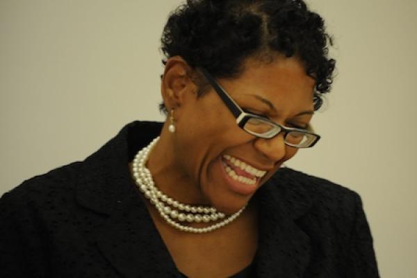 Portrait of woman smiling.