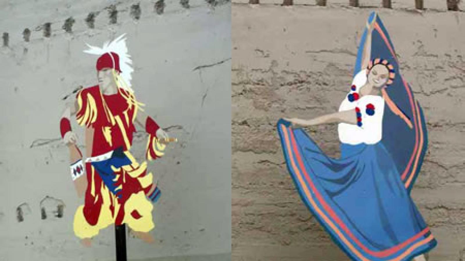 Two of the five metal cutout dancers -- a Yakama fancy dancer and a Mexican dancer -- displayed in a Wapato park