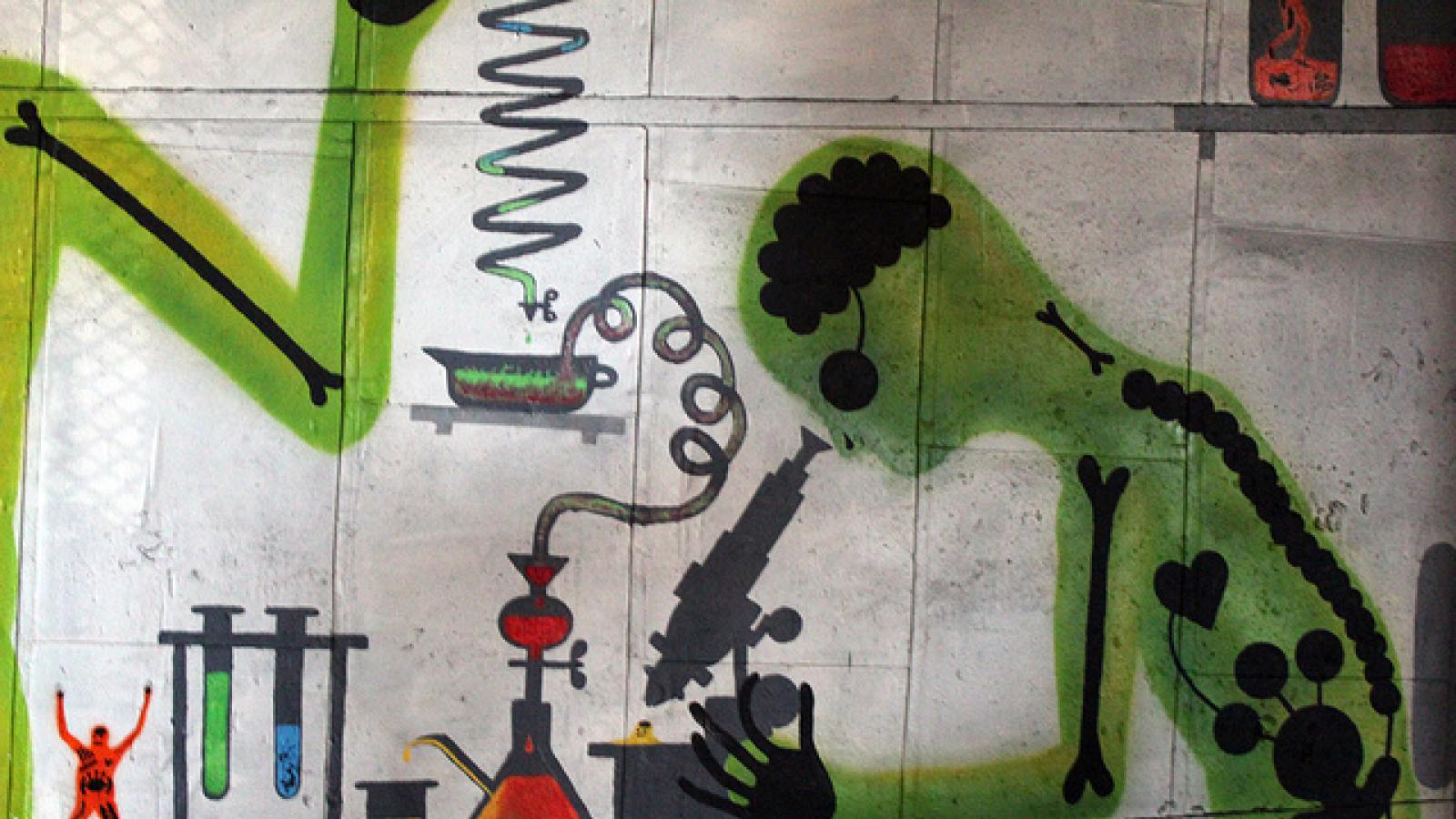 Mural of scientist at microscope Mural of scientist at microscope