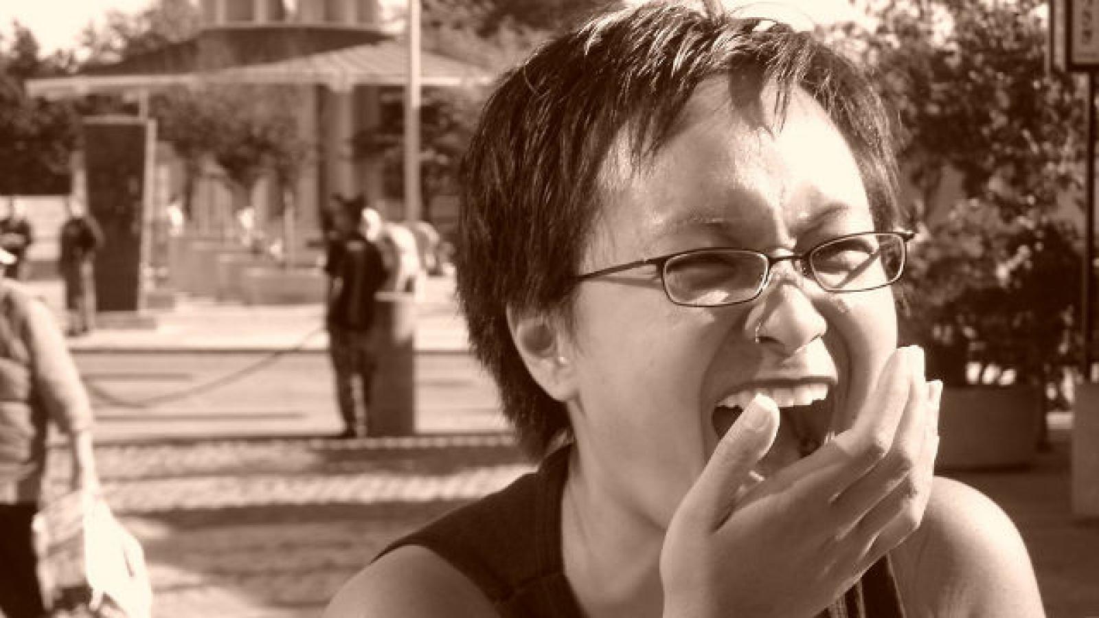 Woman with short hair laughing