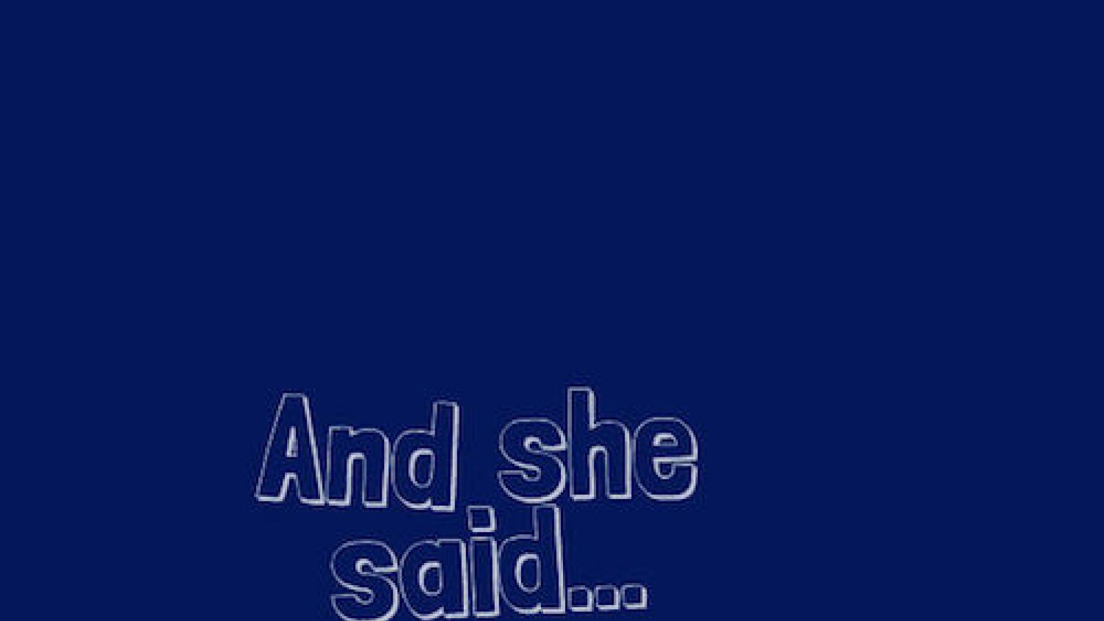 And she said written in white outline letters on royal blue background 